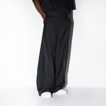 Load image into Gallery viewer, Deconstructed Asymmetric Nylon Pants
