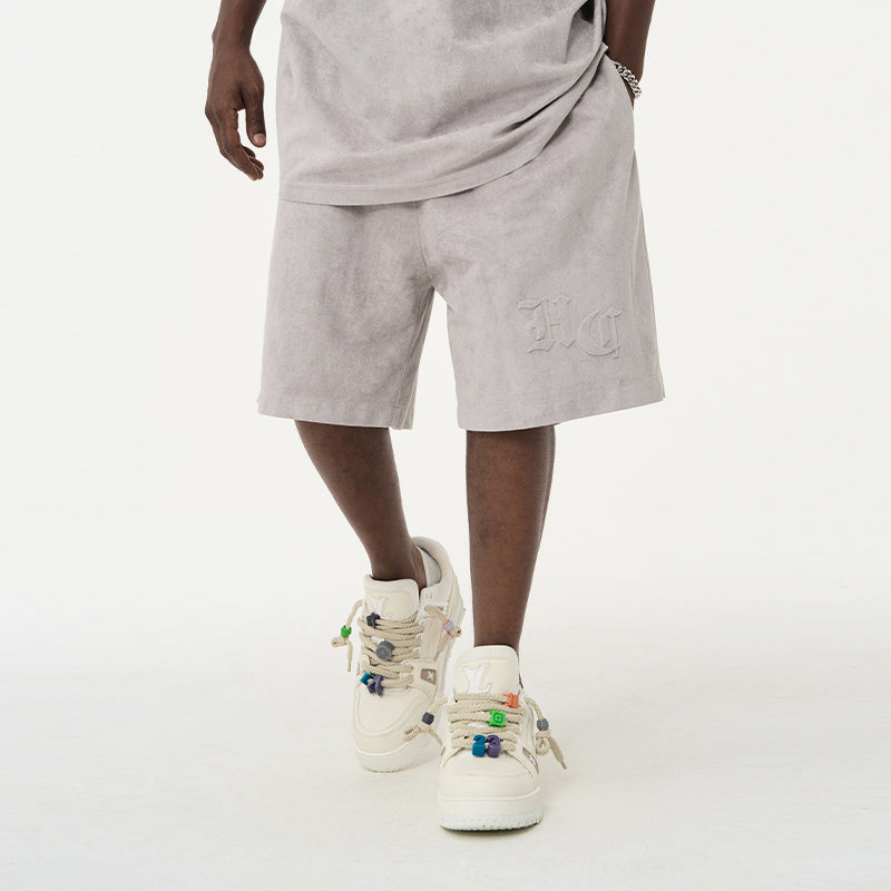 Embossed Gothic Logo Suede Shorts