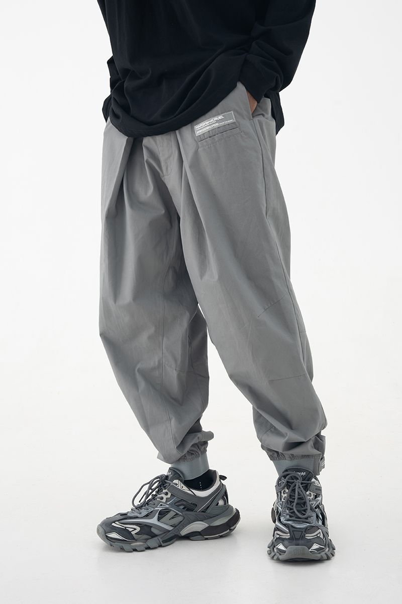 Pleated Logo Trousers
