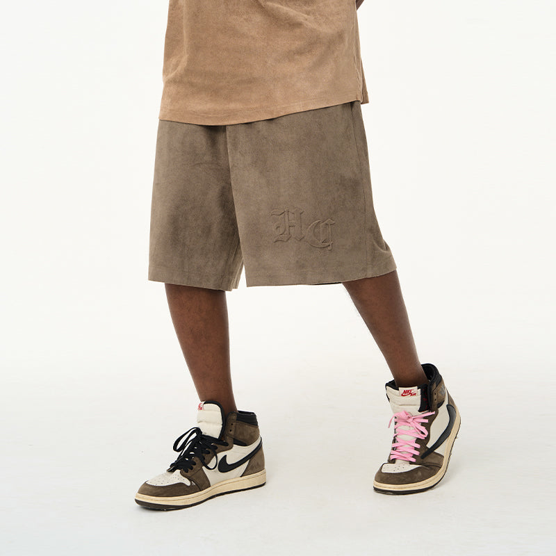 Embossed Gothic Logo Suede Shorts