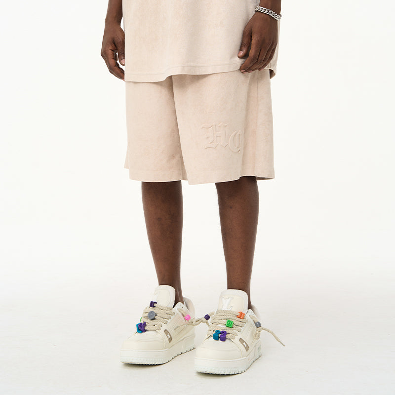 Embossed Gothic Logo Suede Shorts