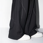 Deconstructed Asymmetric Nylon Pants