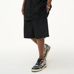 Embossed Gothic Logo Suede Shorts